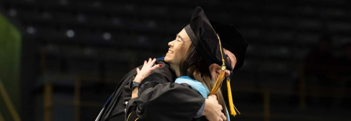 Appalachian State EdD Doctoral student being hooded at the Fall 2023 commencement ceremony